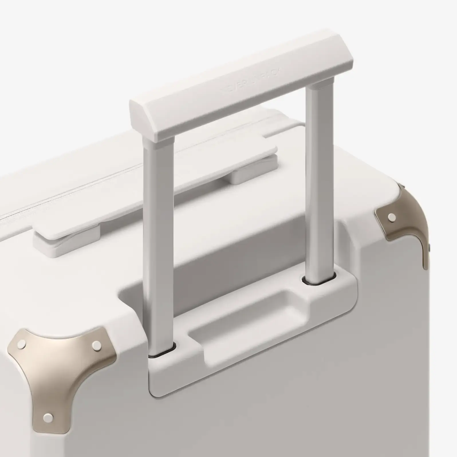 Beige carry-on luggage, The Cabin Trunk Essential by Armoir, telescopic handle detail